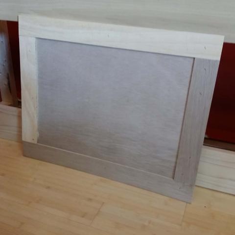 Photo of a simple cabinet door panel.